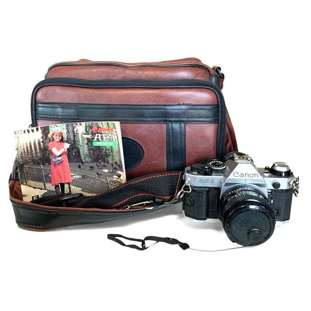 Canon AE-1 Program SLR 35mm Film Camera w/ 50mm F/1.8 Lens & Camera Bag & More